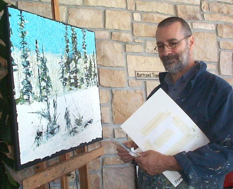 Bertrand Tremblay en train de peindre l